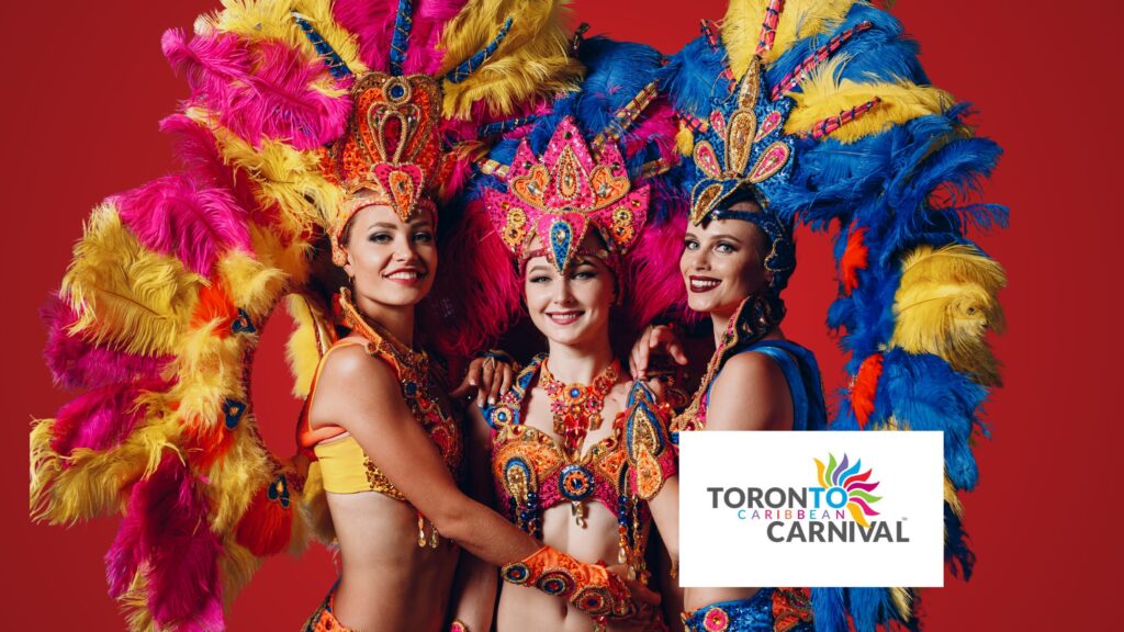 3 women Dressed in carnival costume pieces.